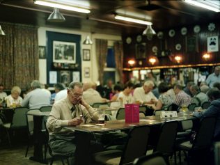 Playing Bingo, alone - Boothy's Working Mens Club, Mansfield | David Severn